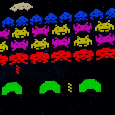 An image of the classic 8 bit evolution arcade game Space Invaders.