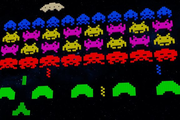 An image of the classic 8 bit evolution arcade game Space Invaders.