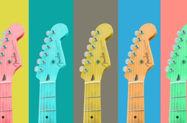 An image of fix guitar heads each a different color, possibly owned by a female indie rock artists or singer.